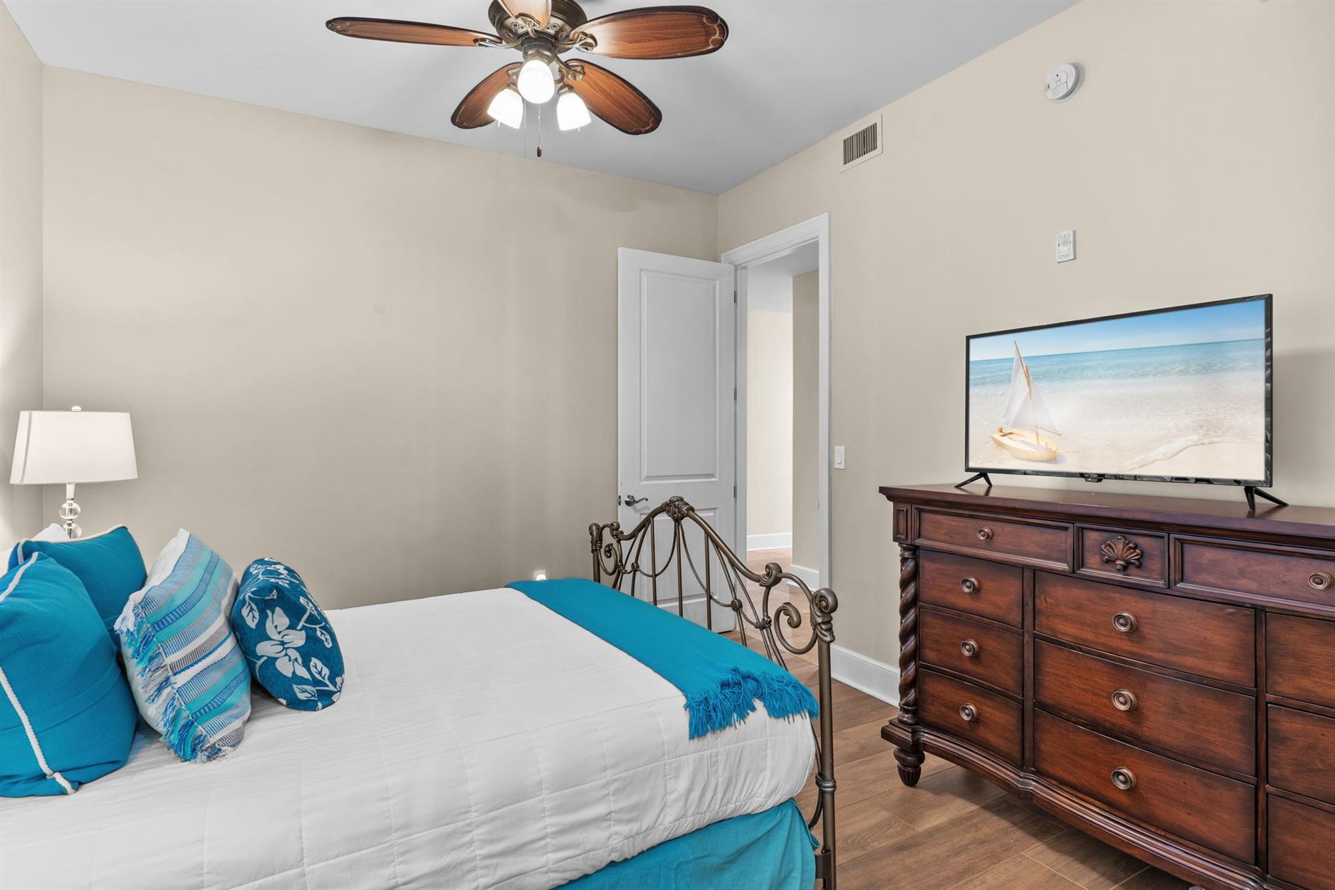 Bedroom 4 with Queen Bed and Flat Screen TV