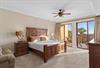 Bedroom 1 with King Bed and Private Access to Balcony