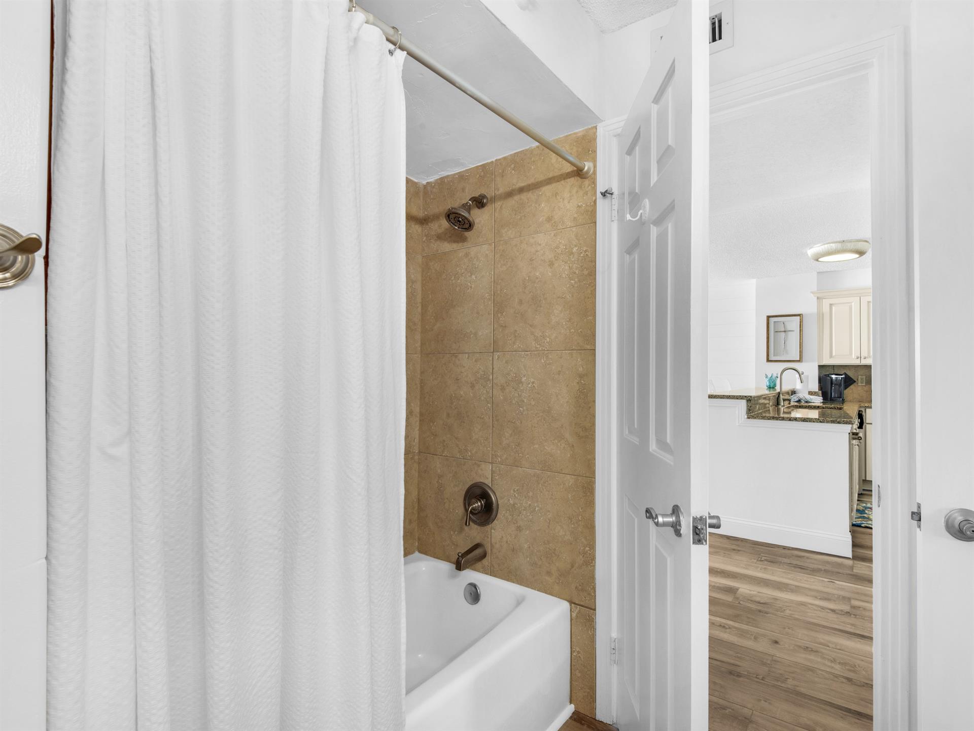Tub and Shower Combo in Bathroom 2