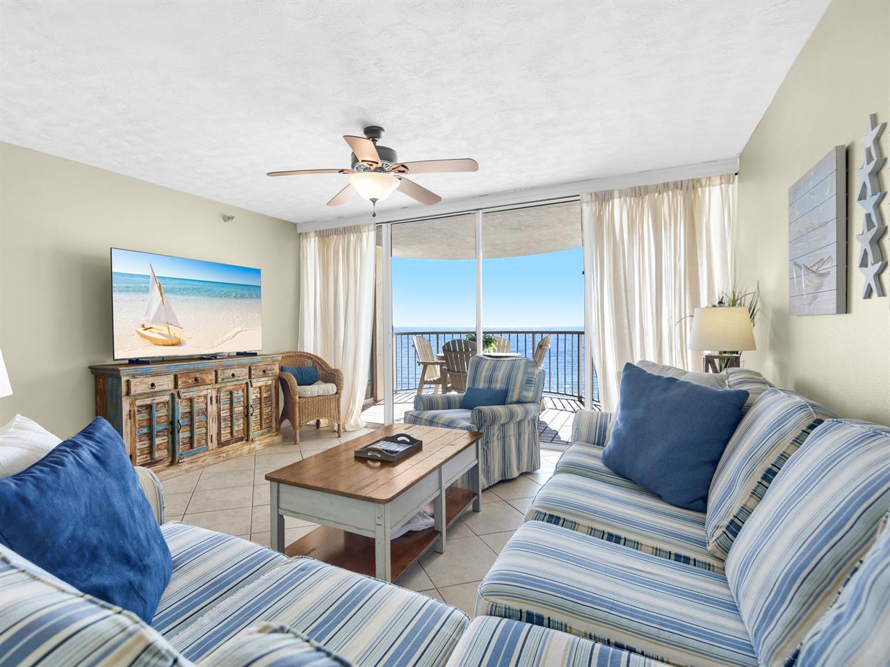 Sink into coastal comfort with ocean views from your private balcony and nauticalthemed décor throughout this inviting living space.