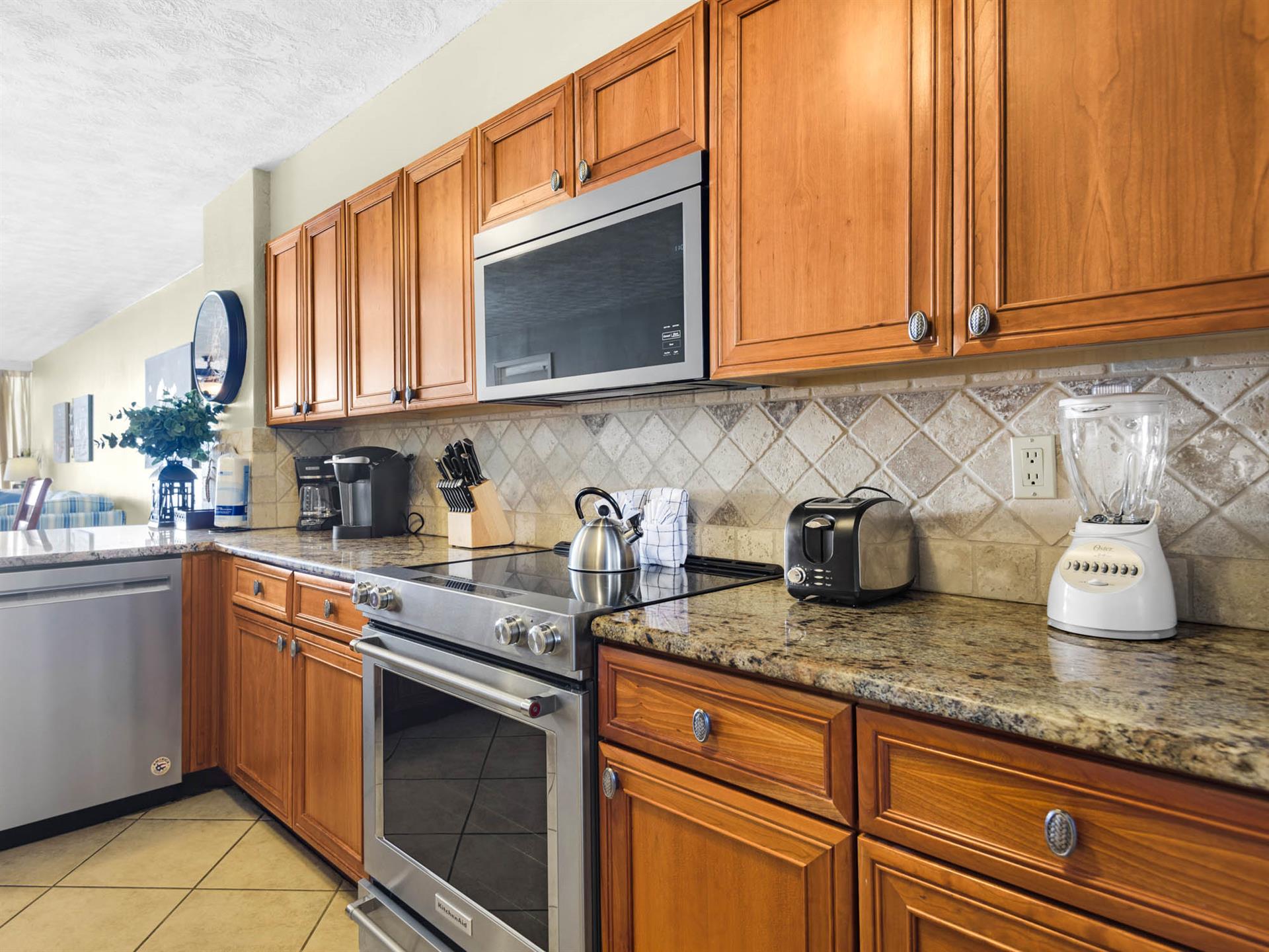 Your fully equipped kitchen features granite counters, stainless appliances, and everything you need to create memorable meals during your stay.