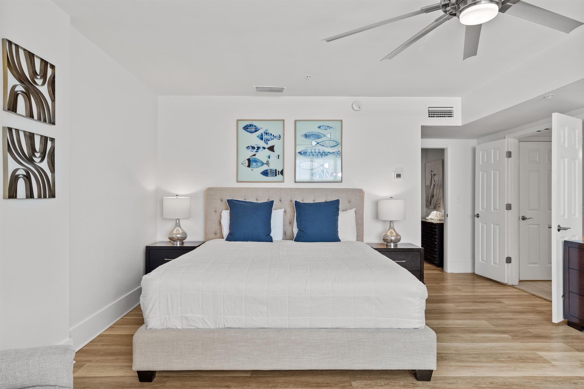 Drift off in your serene coastal 2nds floor master suite, where nautical artwork and plush bedding create the perfect seaside sanctuary.