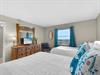 Rest comfortably in your double bed bedroom with cheerful turquoise accents and lovely views from your window.