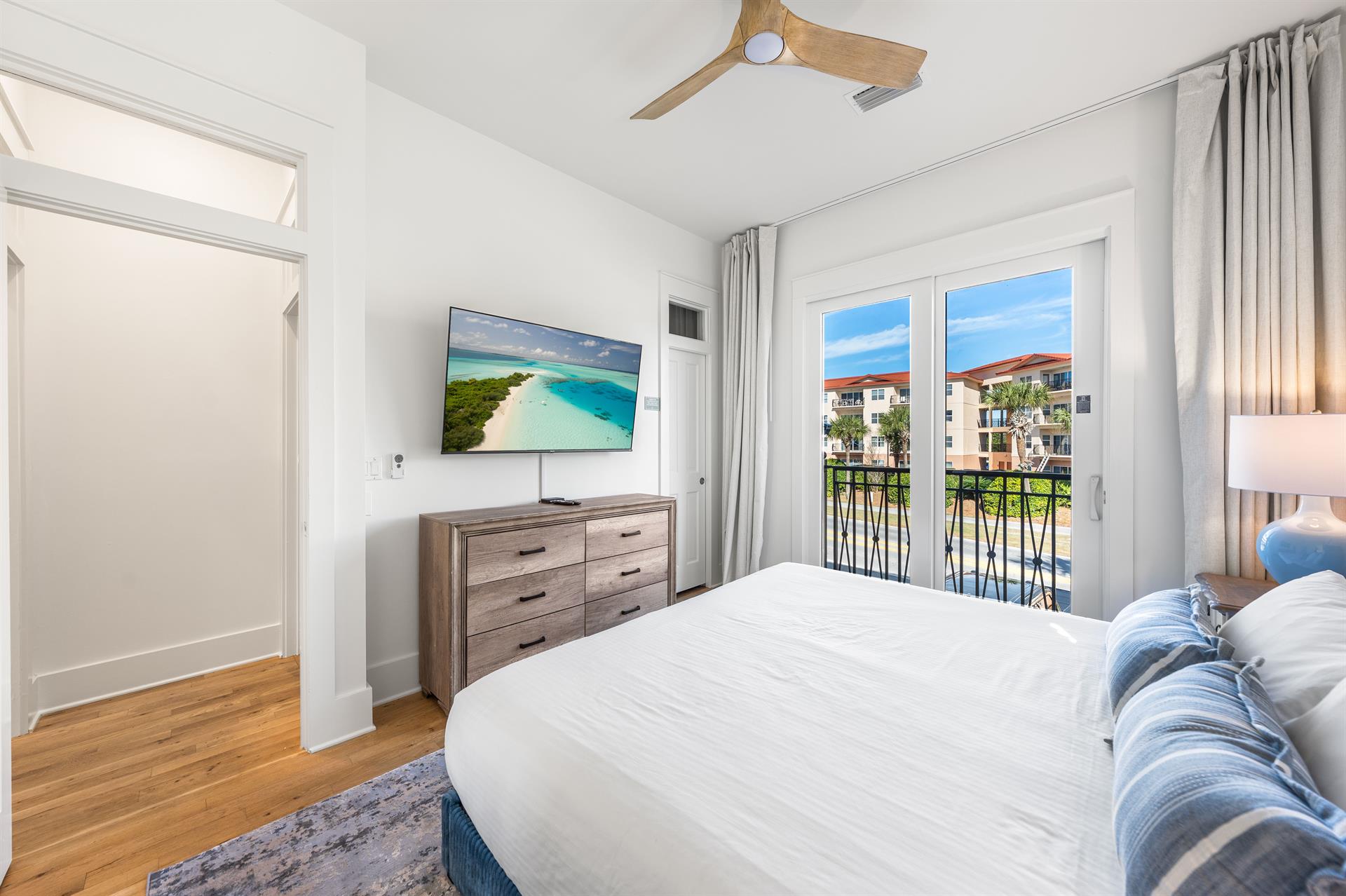 Second Floor King ensuite Bedroom North Sidewith a 55 Smart TV.