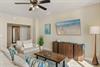 Relax in your bright living room with coastal artwork and comfortable seating that makes you feel right at home.  Plus there is a sleeper sofa for additional guests.