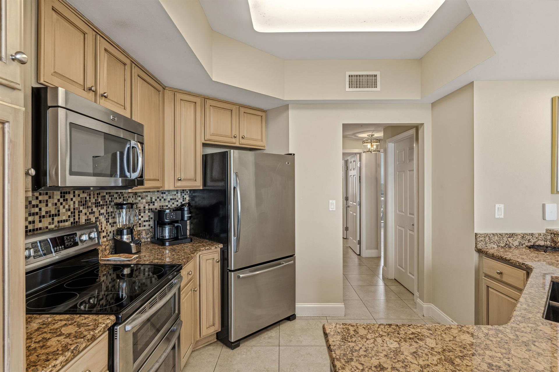 Your fullyequipped kitchen features granite countertops, stainless steel appliances, and everything you need to prepare delicious meals during your stay.