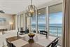 Dine enjoying sweeping ocean views and windows that flood the space with natural light.