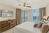 Wake to endless ocean views from your serene bedroom sanctuary, where gentle waves greet you each morning through floortoceiling windows.