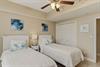 Bedroom 3 Drift off in this coastalthemed bedroom where two comfortable beds await, complete with soothing seainspired artwork and gentle ceiling fan breezes.