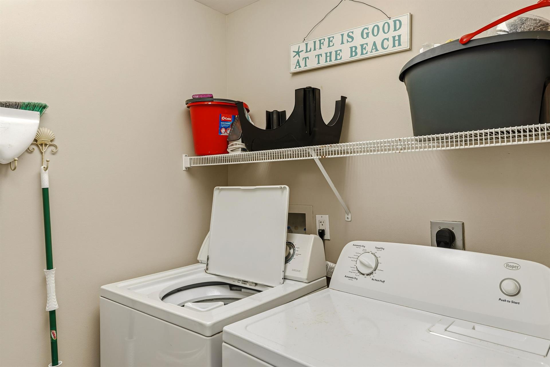 Your private laundry room keeps beach clothes fresh with fullsize washer and dryer, plus storage for all your essentials.