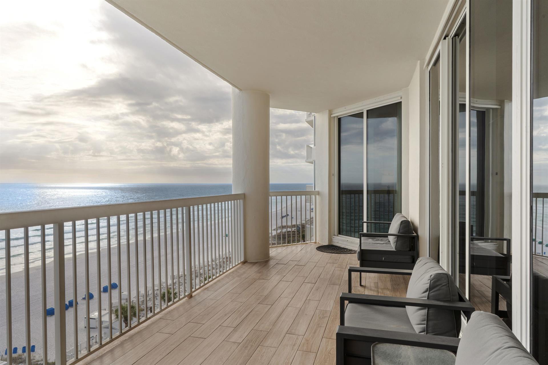 Unwind on your private oceanfront balcony with comfortable seating where endless sea views create the perfect backdrop for morning coffee.