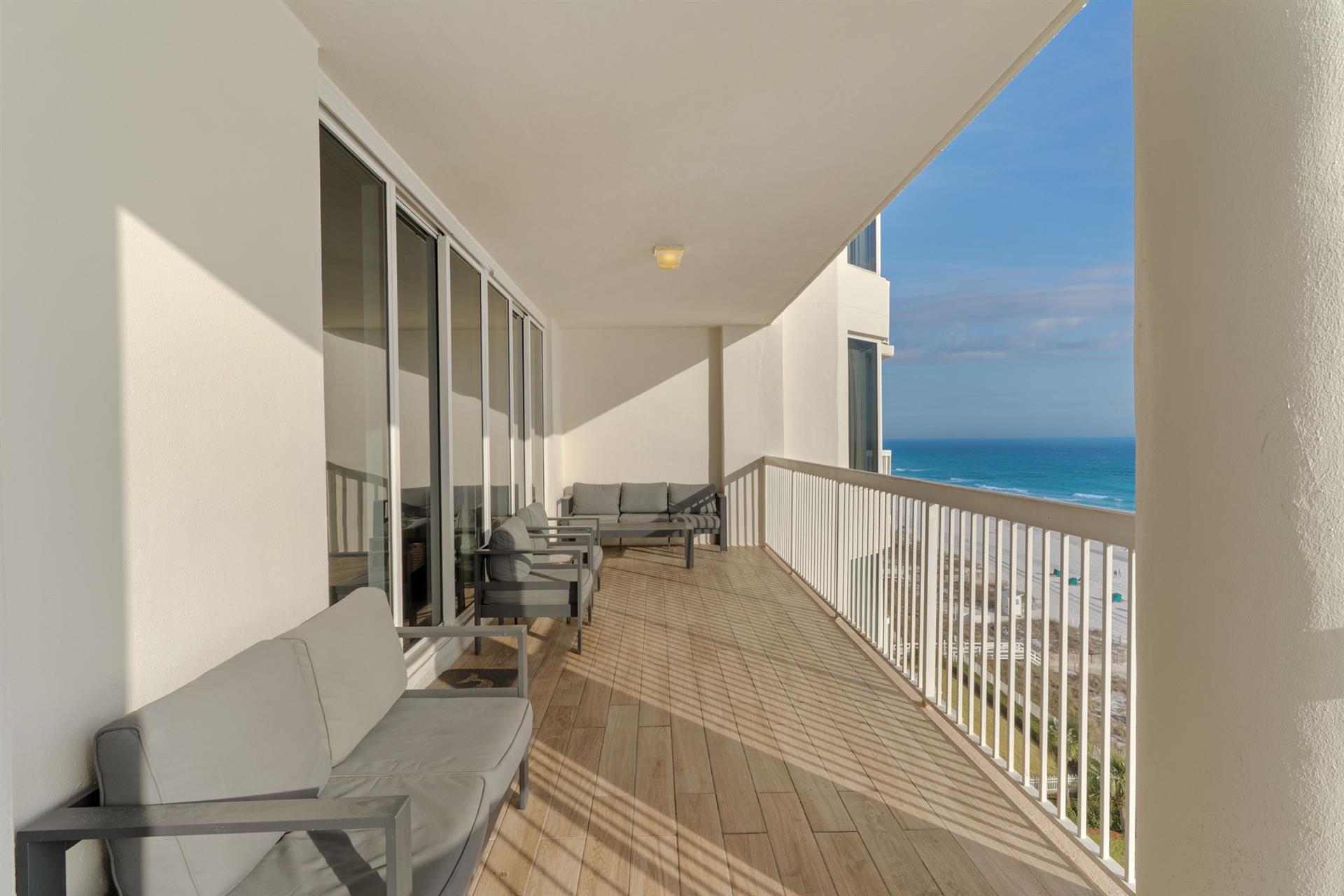 Step onto your private oceanfront balcony where comfortable seating awaits and endless sea views stretch to the horizon.