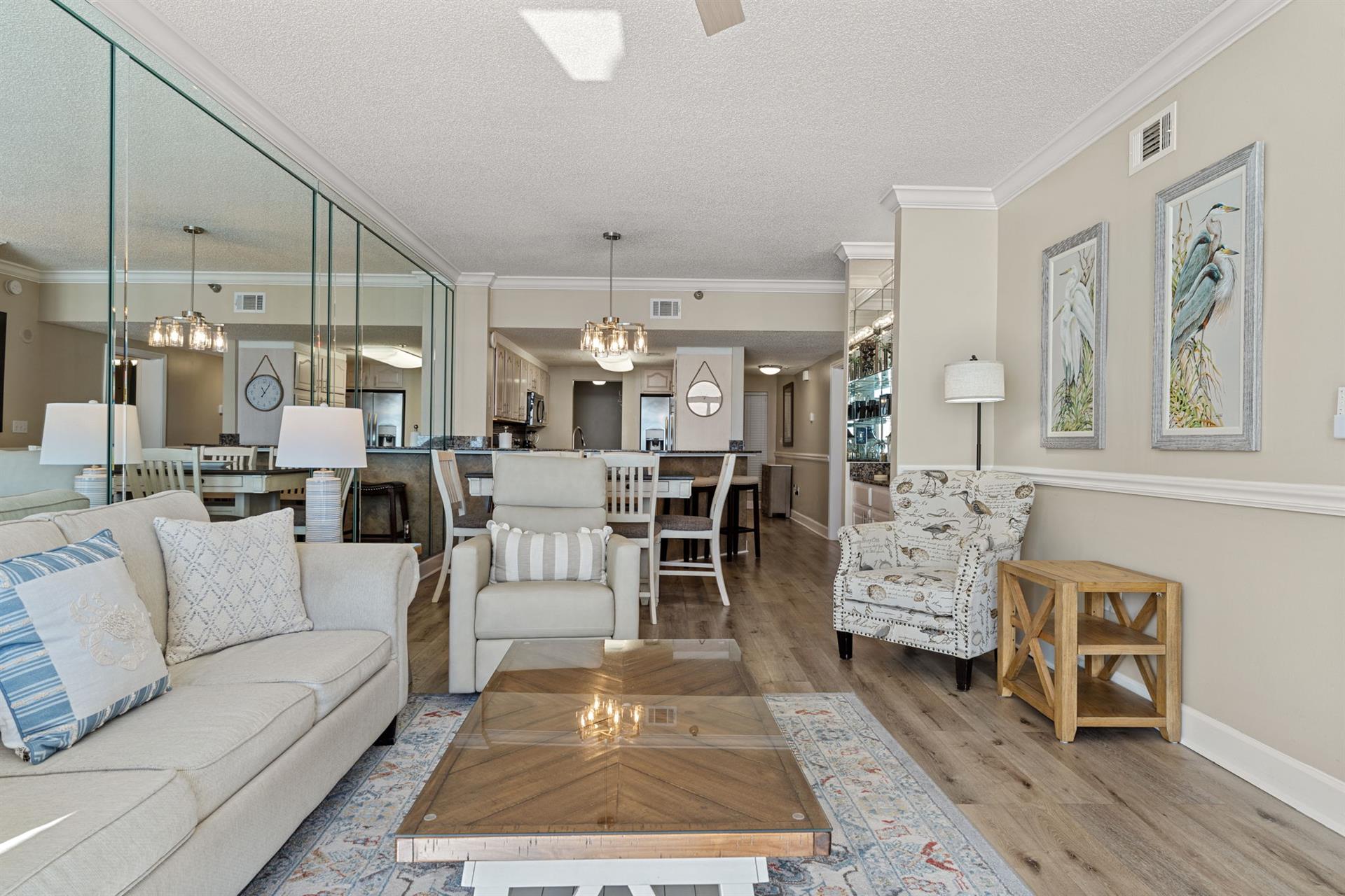 Elegant living space where coastal charm meets modern comfort, featuring an open layout perfect for your getaway.