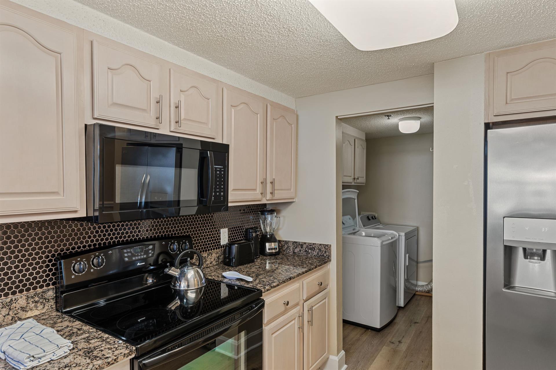 Your fullyequipped kitchen awaits with granite counters, modern appliances, and convenient inunit laundry just steps away.