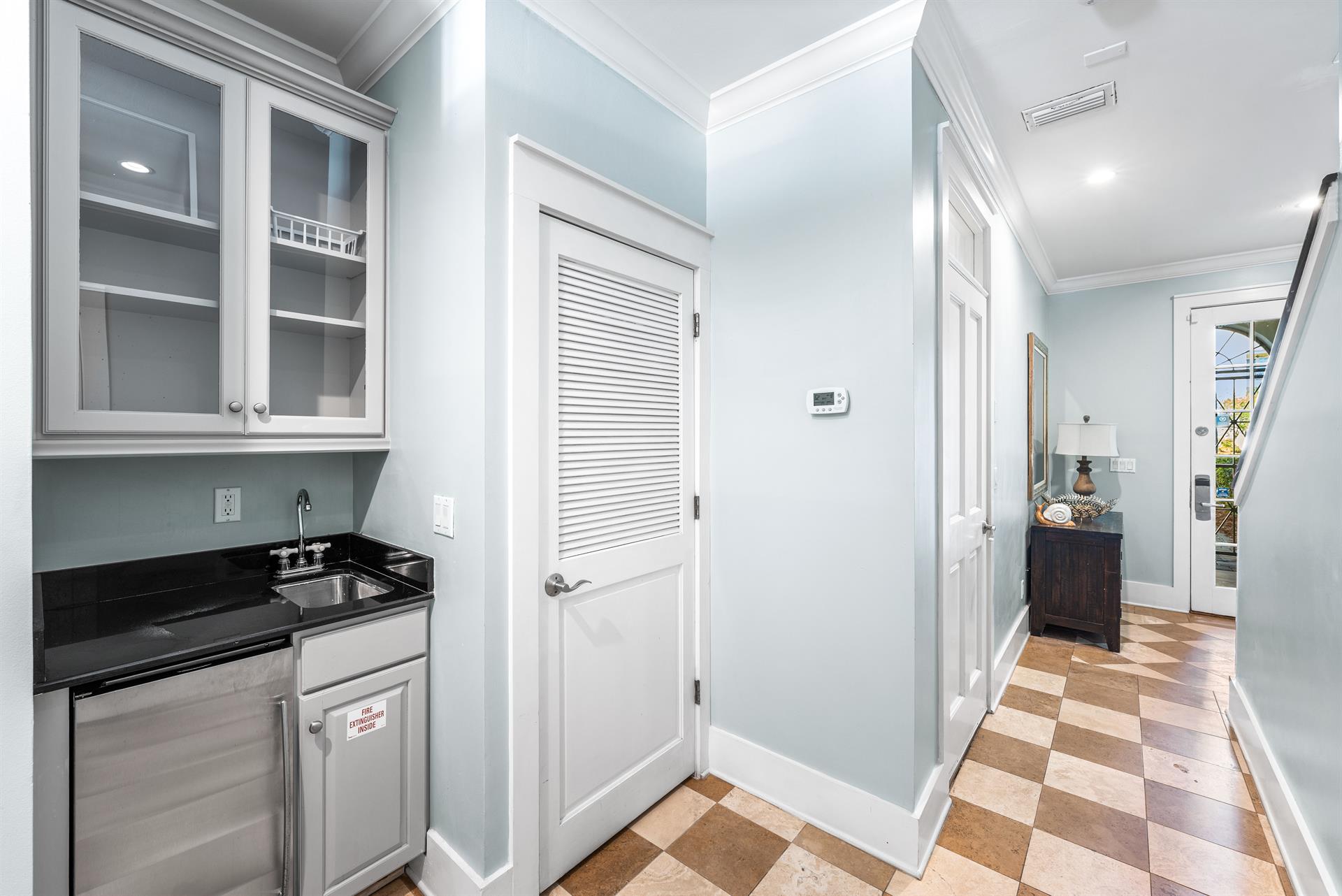 First Floor Hall Leading to the Bunkroom and Front Entry Door.