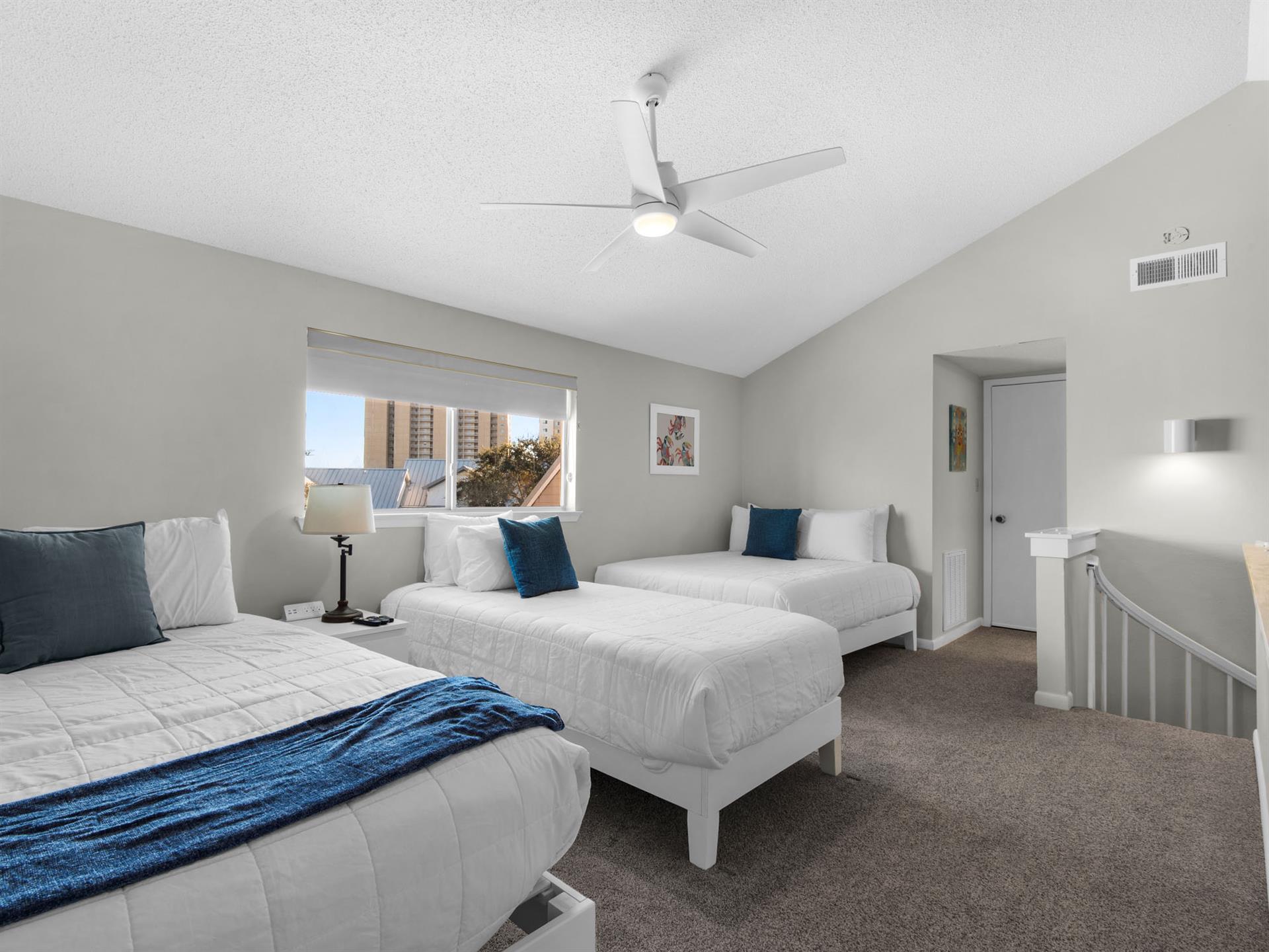 Loft Bedroom with Two Full beds, and One Twin Bed