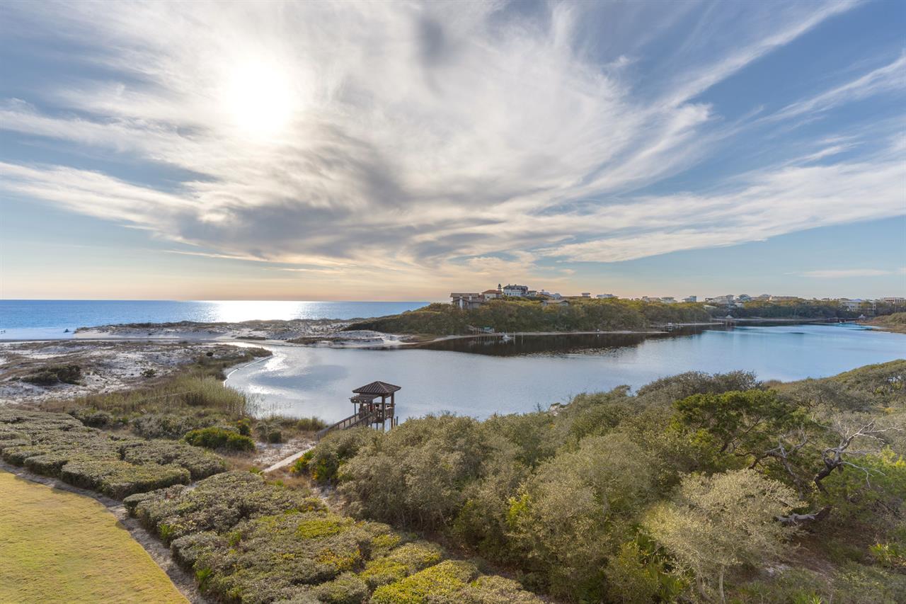 Stunning coastal landscape features gulf front views, pristine waterways, and native vegetation.