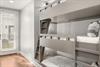 The cozy bunk bed retreat features natural lighting