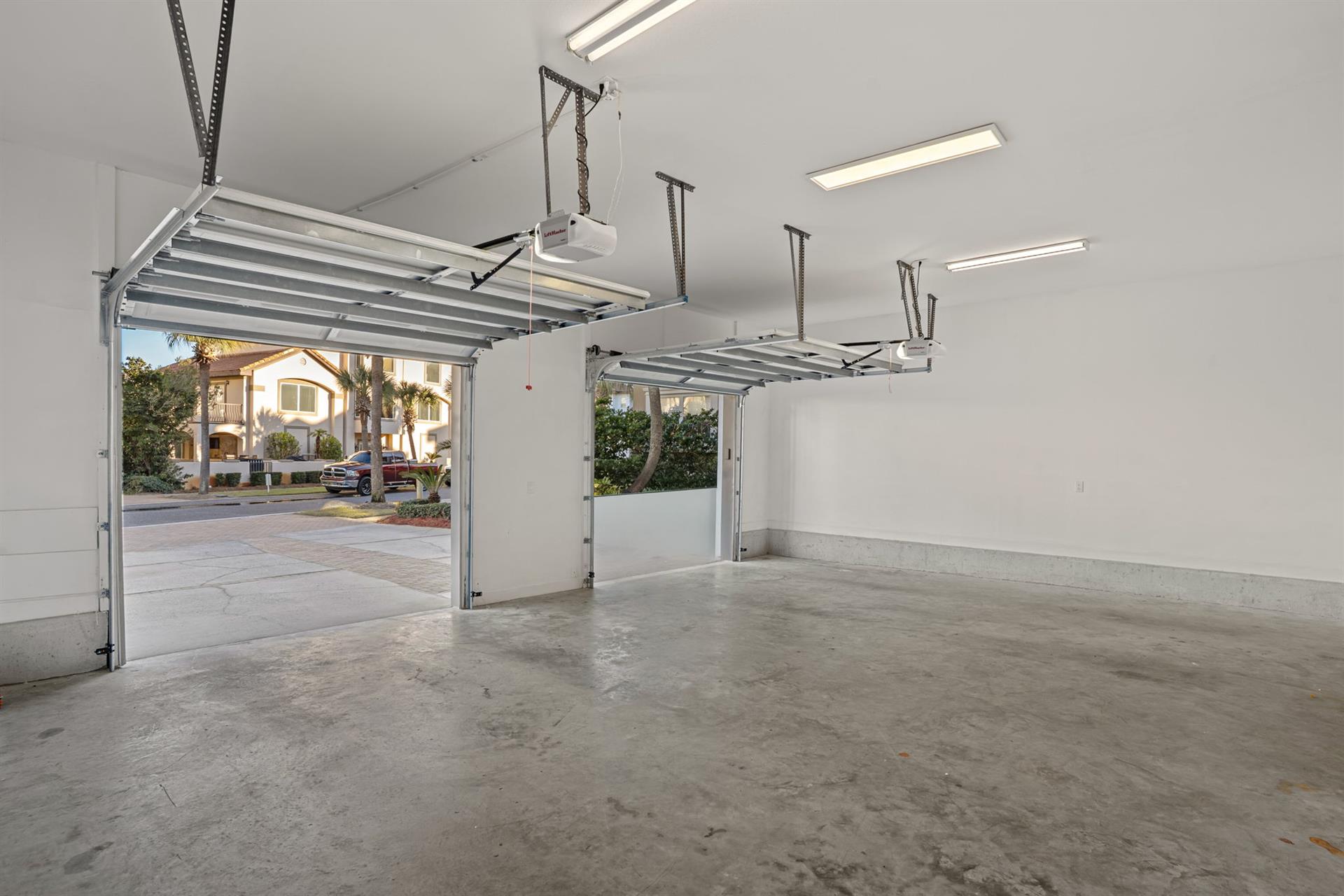 Private twocar garage offers secure parking with convenient overhead storage and direct access to your vacation home.