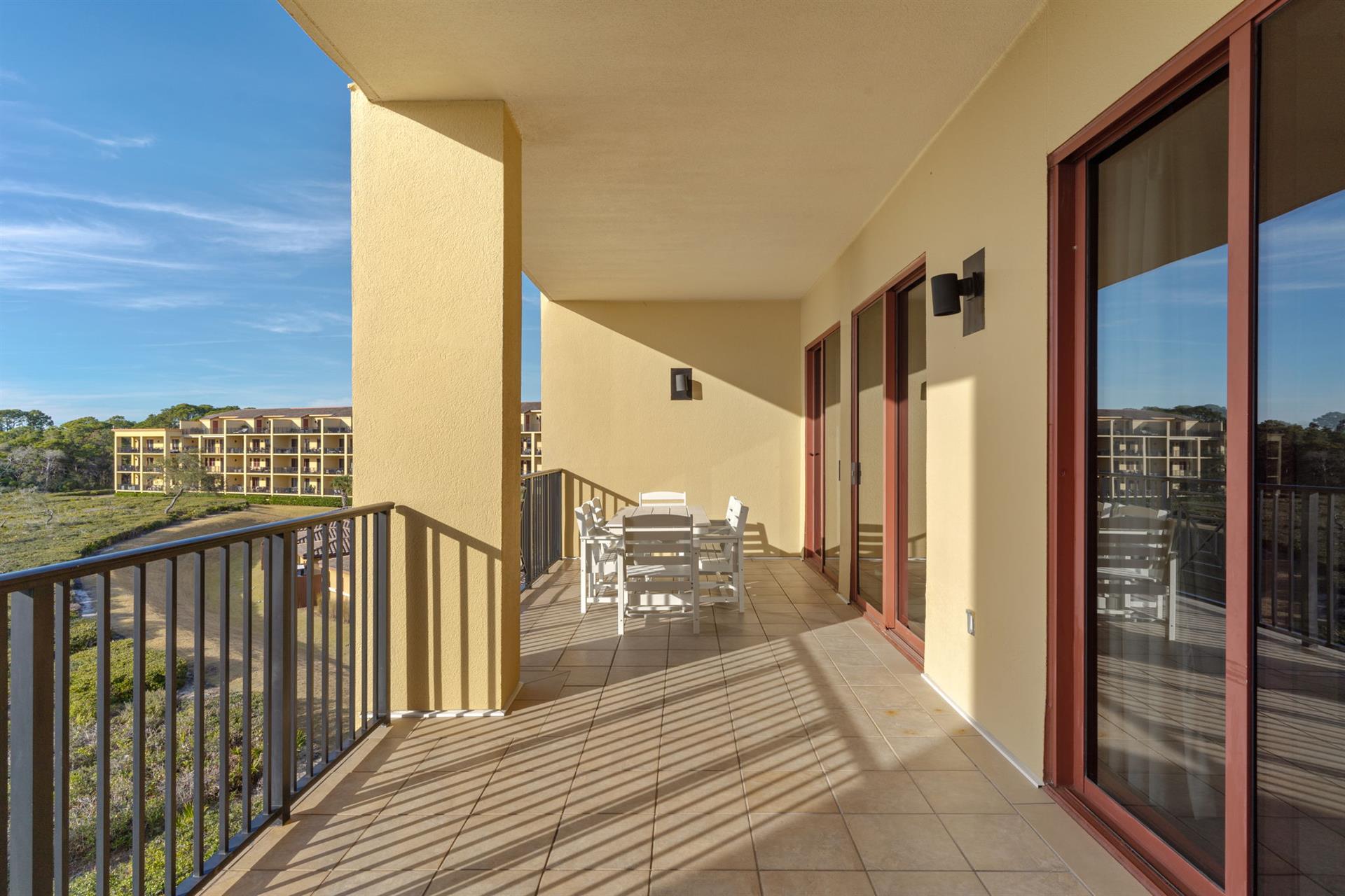 Step onto your private terrace and breathe in the fresh air while enjoying outdoor dining with scenic views stretching beyond.