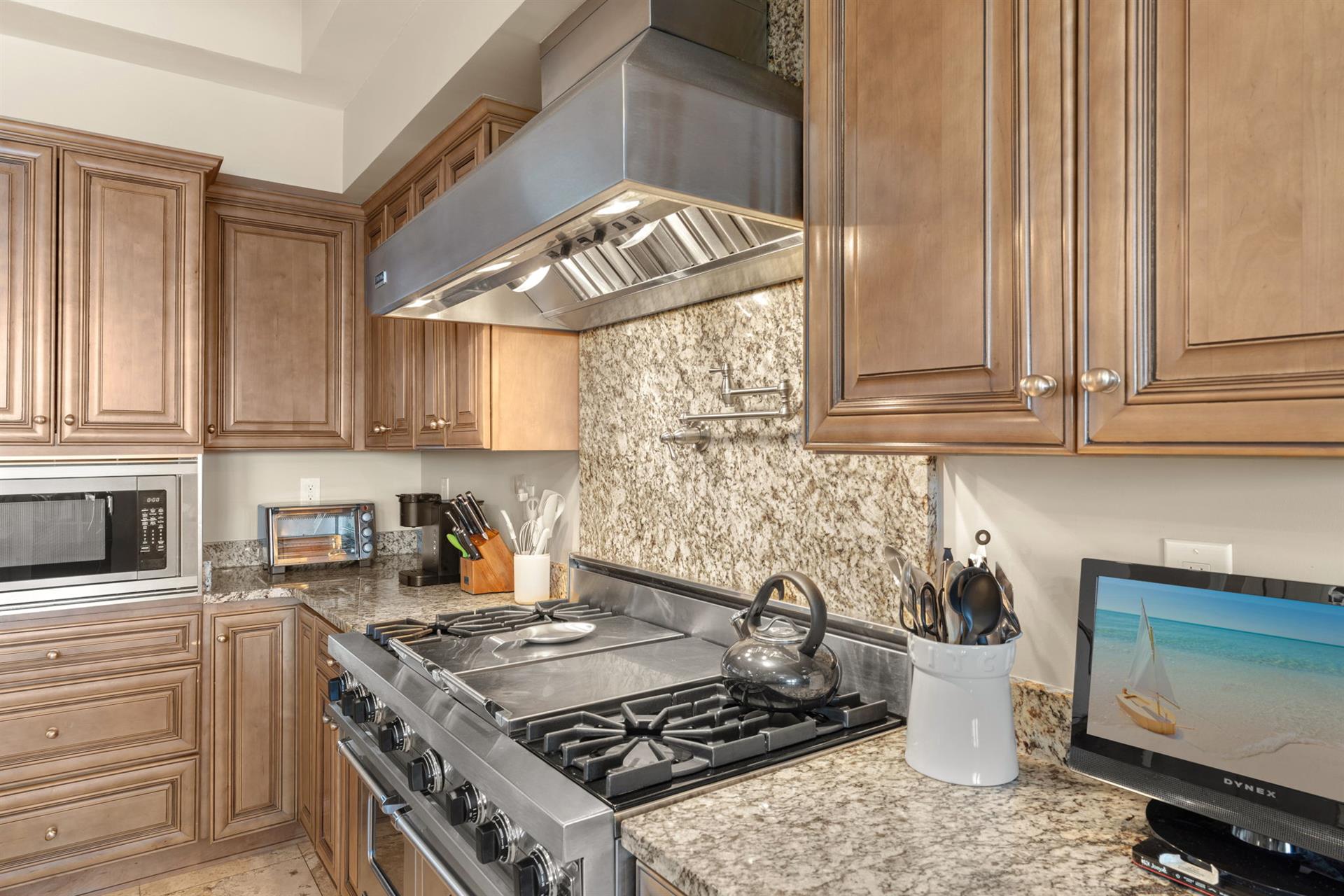 Your gourmet kitchen features professionalgrade appliances and granite countertops, perfect for creating memorable meals during your stay.