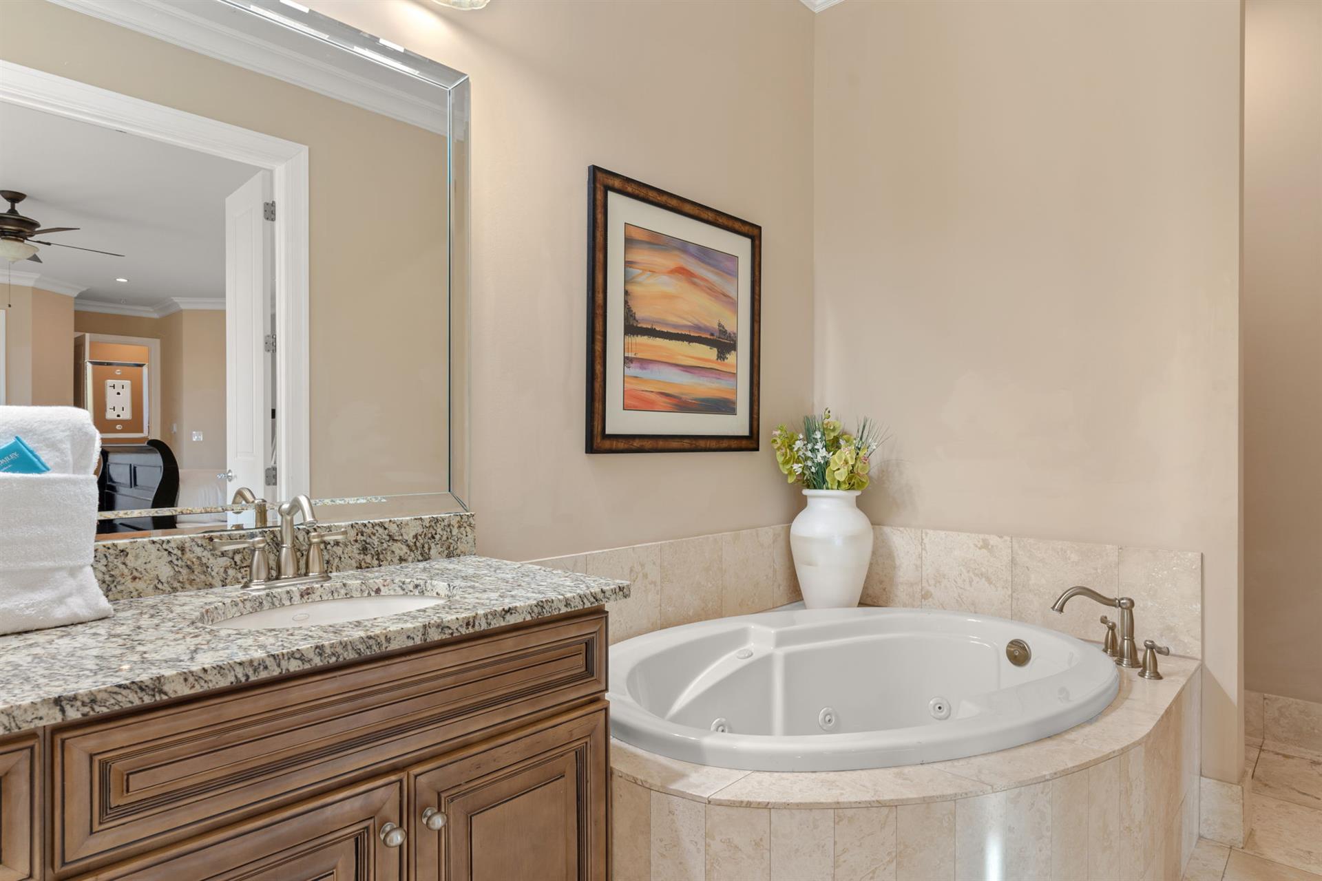 Soak away your worries in your private jetted tub, surrounded by elegant granite finishes and warm touches.