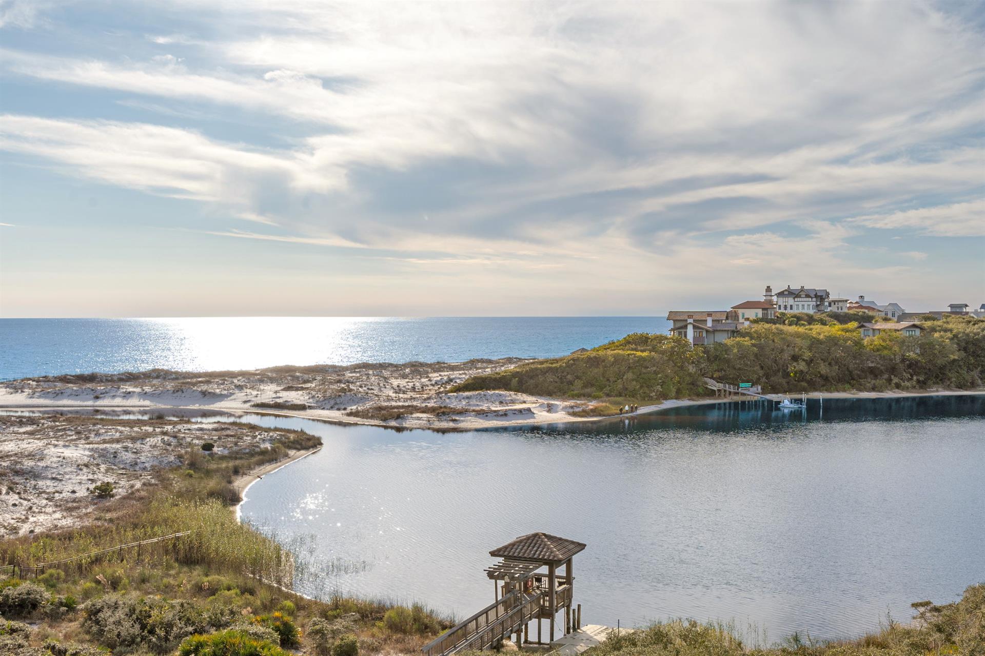 Coastal paradise with pristine beaches, turquoise waters, and charming oceanfront homes creating the perfect seaside escape.
