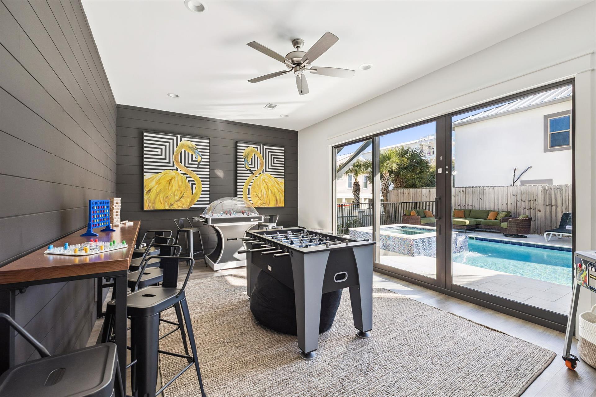 Challenge friends to foosball while enjoying the pool view