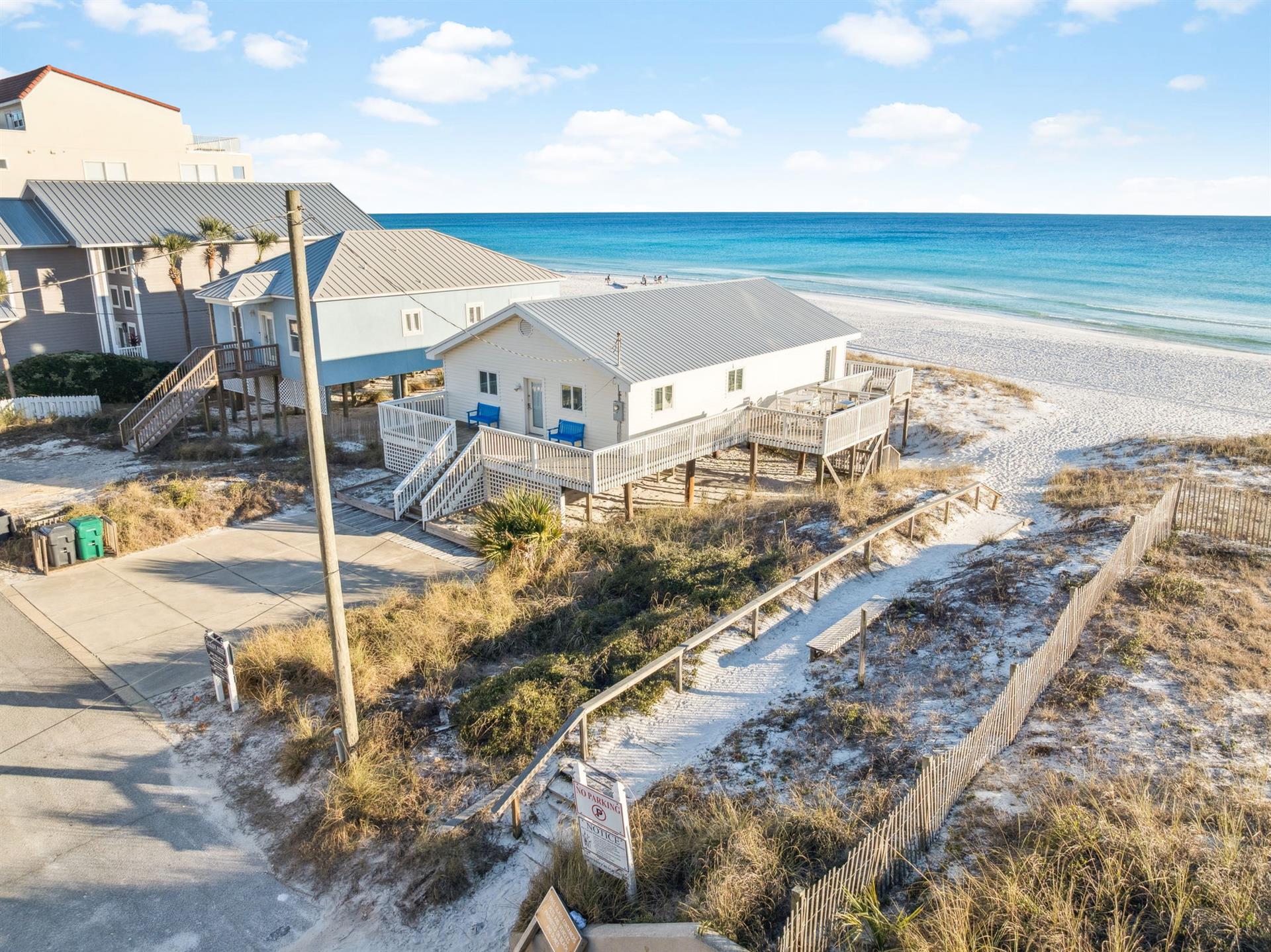 Miramar Beach vacation home with direct beach access and stunning Gulf waters just steps from the shore.