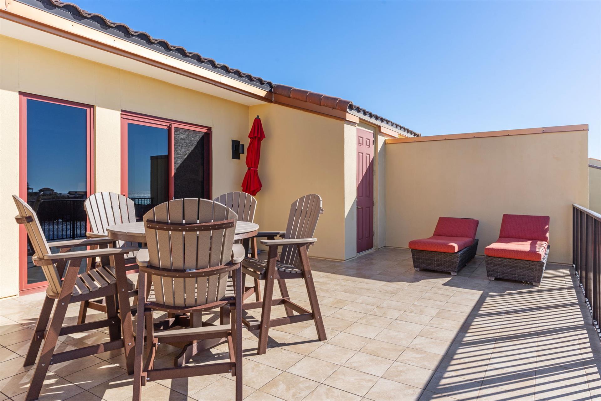 Dine and Relax on the Private Balcony off Bedroom 1