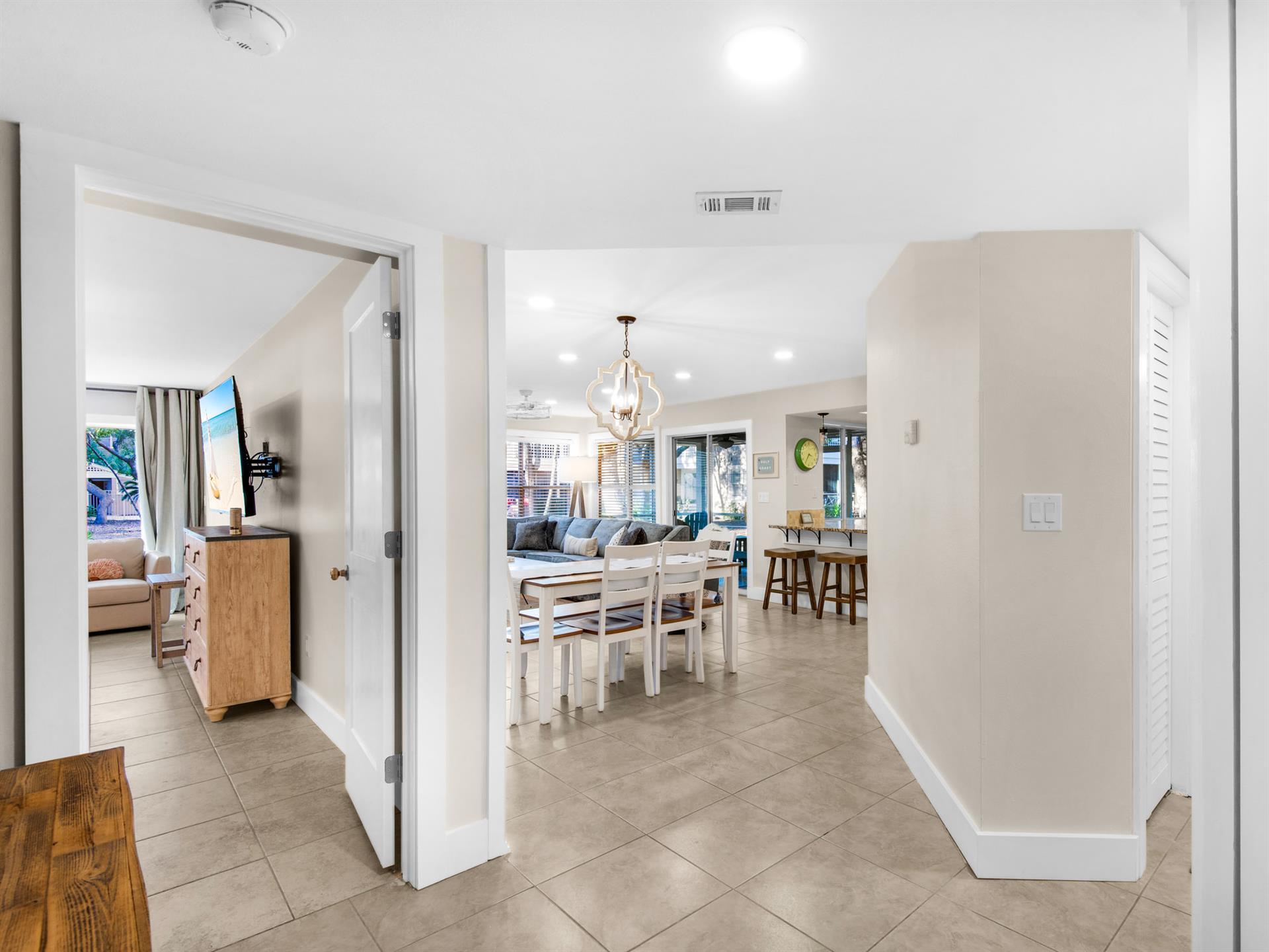 Step into your bright, openplan living space where natural light flows through every corner, connecting the dining area to your comfortable living area