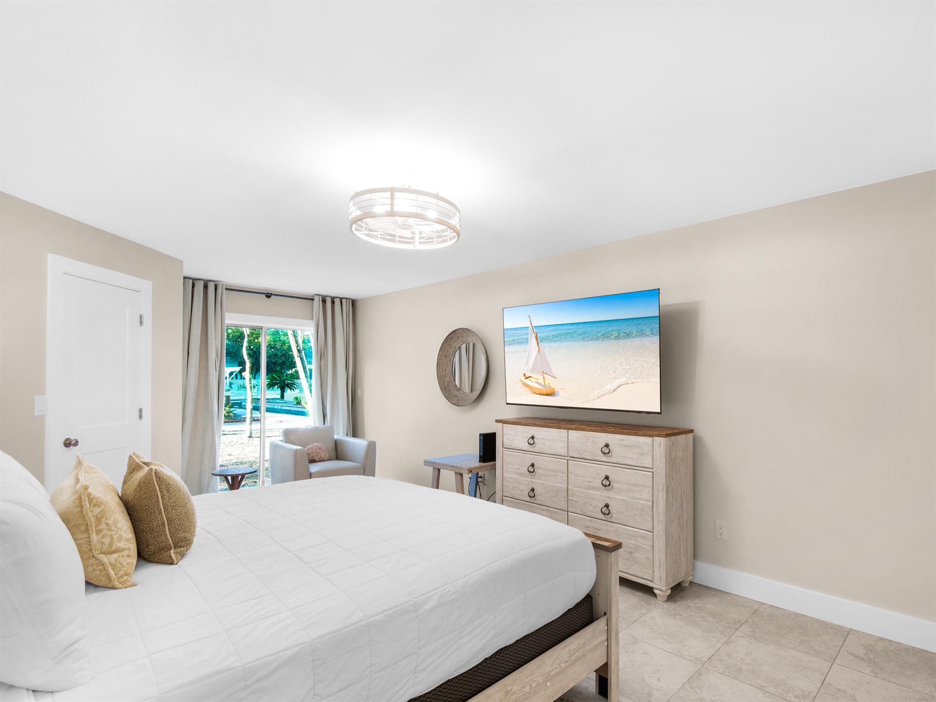 Drift off to sleep in your serene bedroom with fountain views, coastal artwork, and thoughtful touches.
