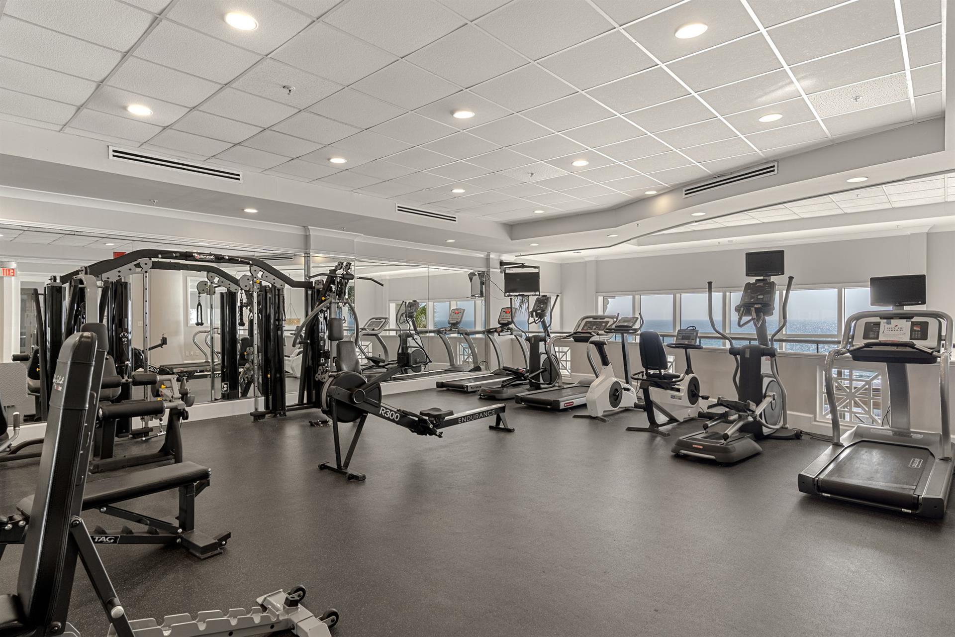 Stay active with onsite fully equipped fitness center featuring cardio machines, strength training equipment, and beachfront views to energize your workout.