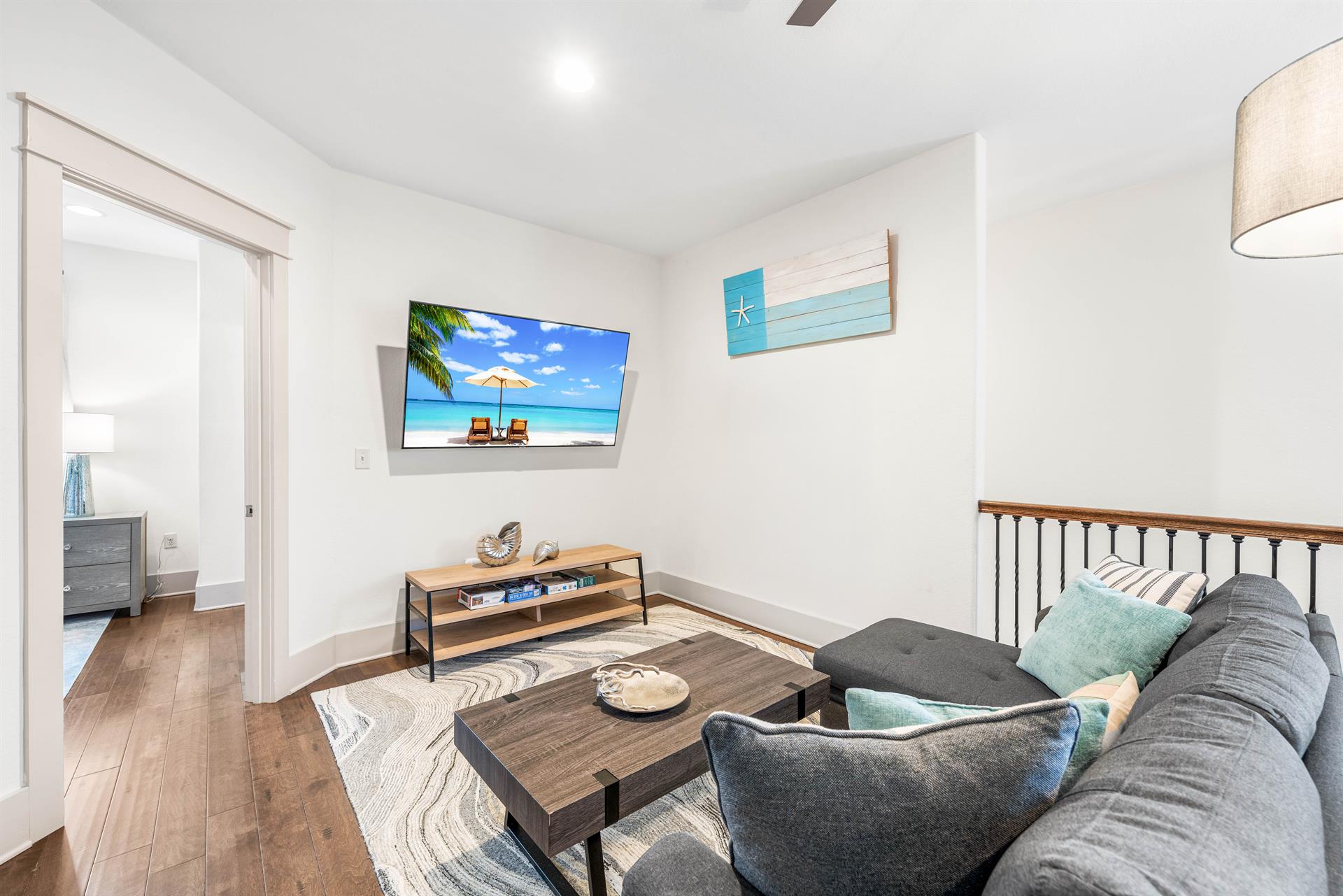 2nd floor bonus living area with kids in mind  Table for 6 perfect for games or puzzles.  Sofa  65 Smart TV with Cable Also