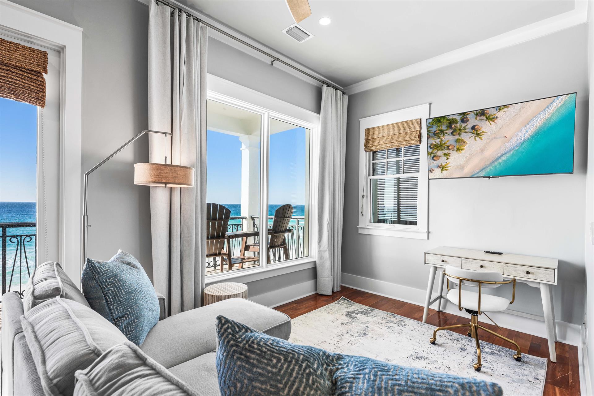 3rd Floor Primary Couch, Desk wit Chair and Flat Screen Television