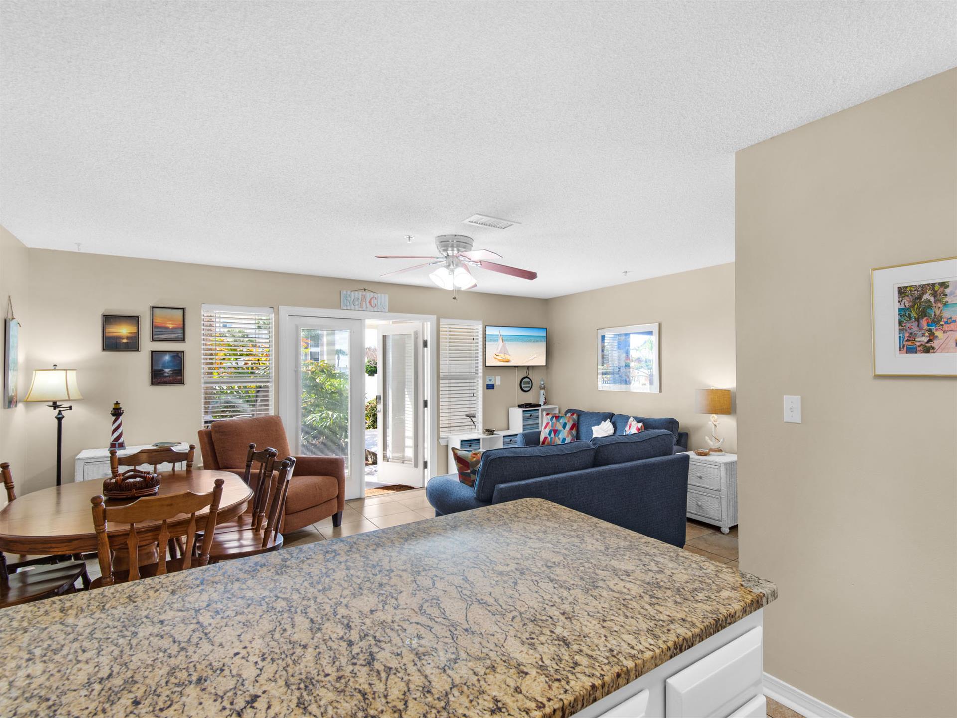 Openconcept living space where kitchen, dining, and lounge areas flow seamlessly together for memorable vacation moments.