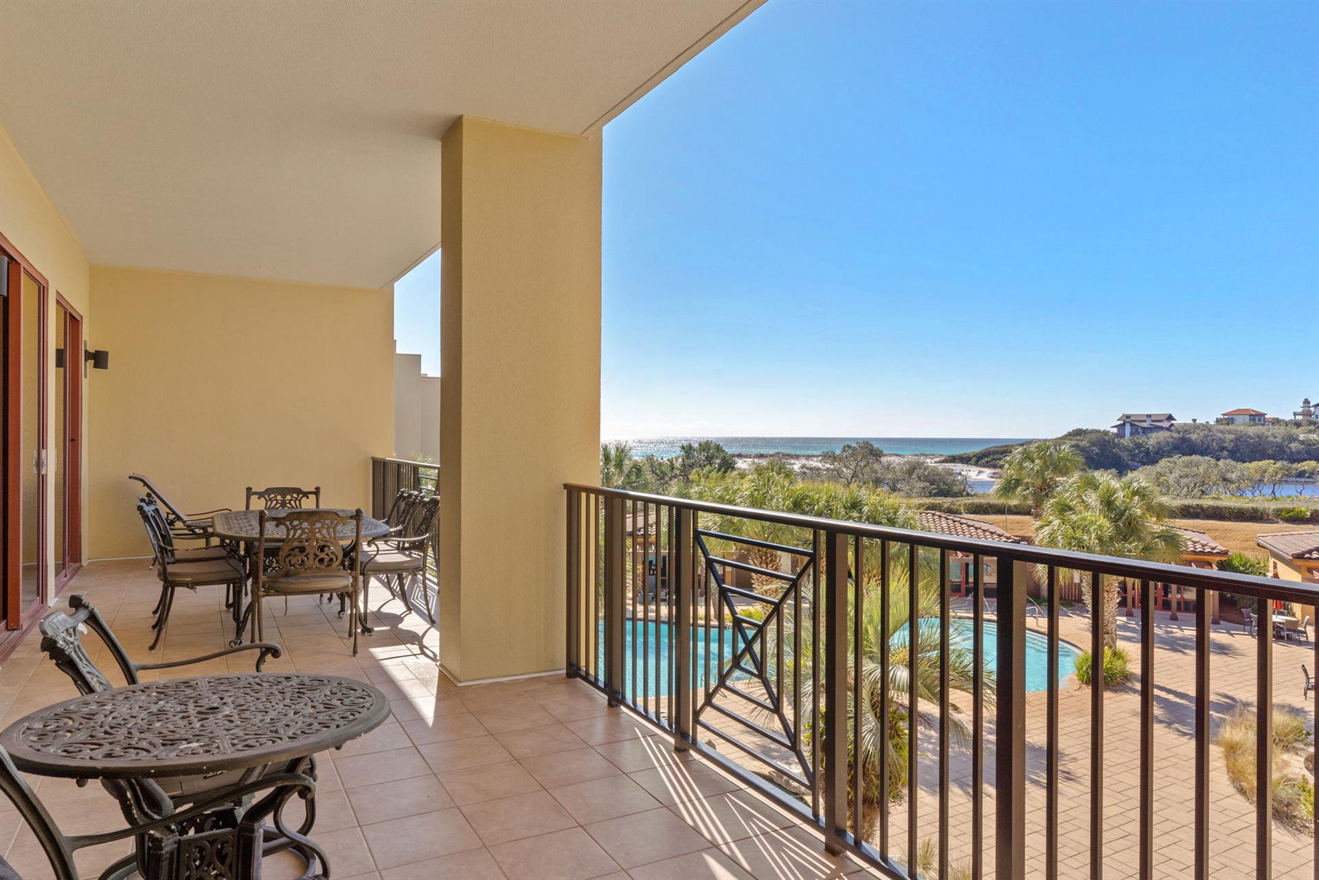 Step onto your private balcony and soak in stunning pool and gulf views while enjoying morning coffee at your outdoor dining set.