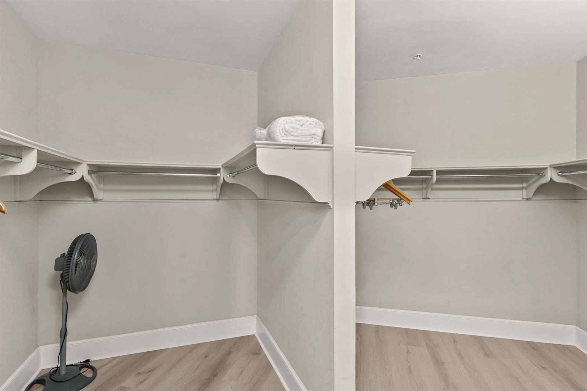 Your spacious walkin closet offers abundant hanging space and thoughtful organization for all your vacation wardrobe needs.