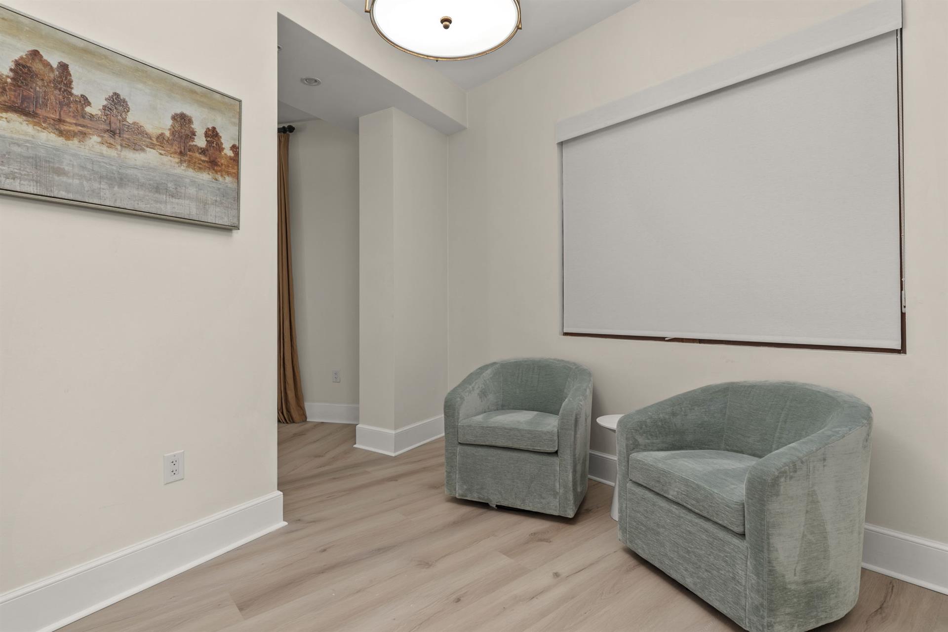 Unwind in your private seating area with plush chairs and elegant decor  perfect for quiet moments together.