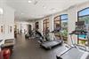 Fitness Center Overlooks Pool Area