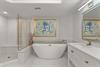 Bathroom 1 Luxurious bathroom with soaker tub a view