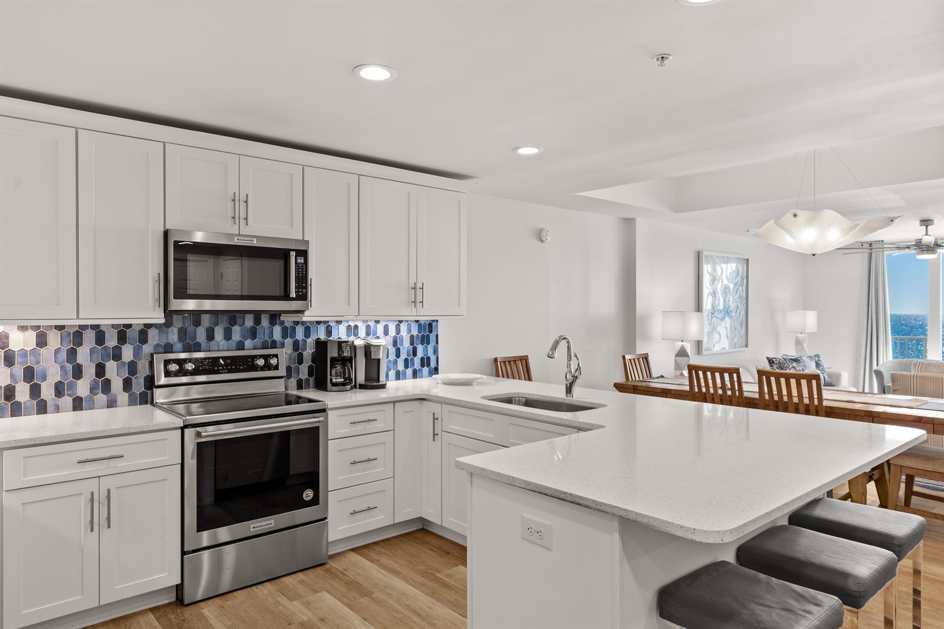 The breakfast bar is perfect for morning coffee or casual dining.