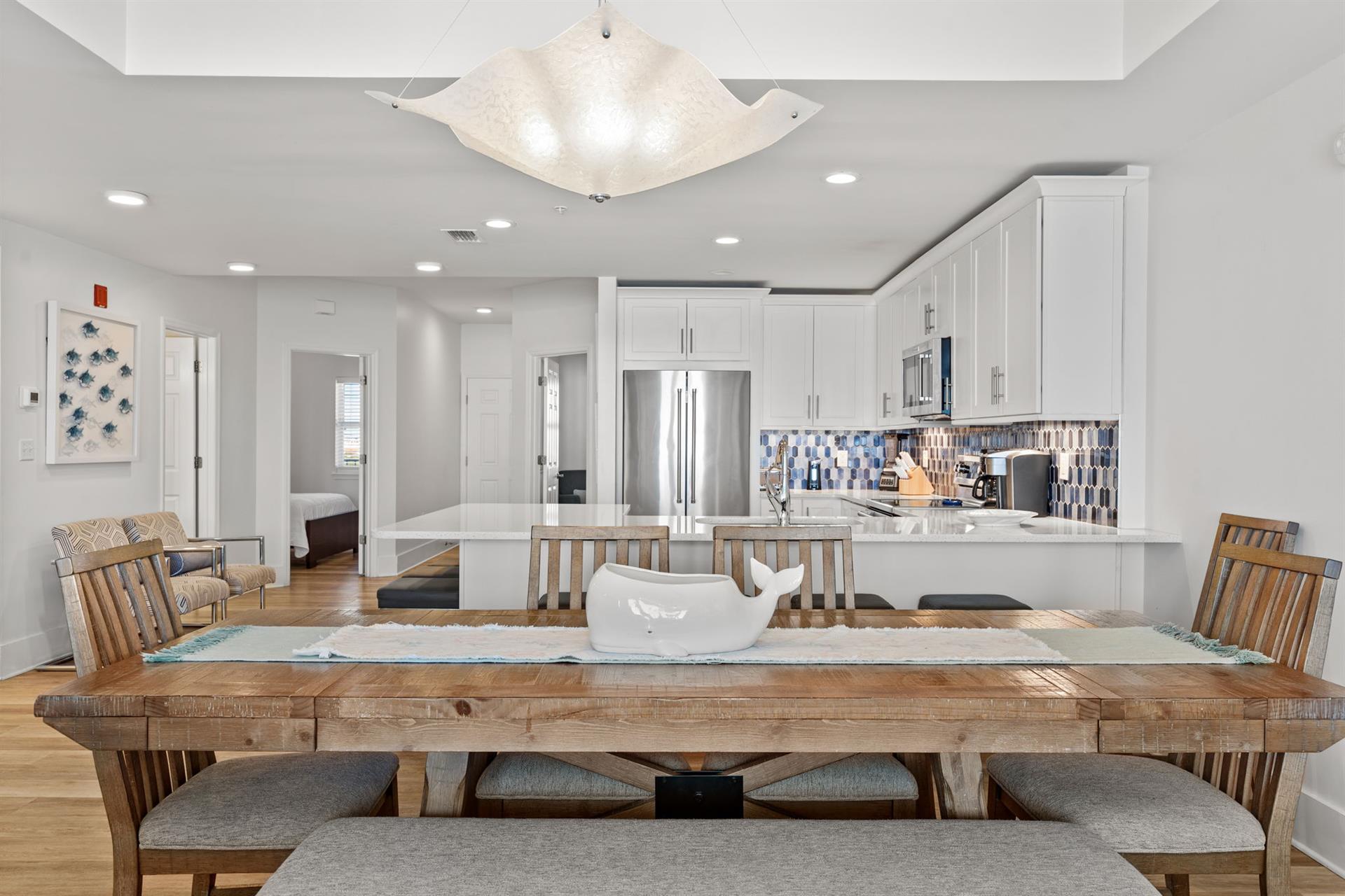 Gather around this stunning table where warm wood meets modern elegance..