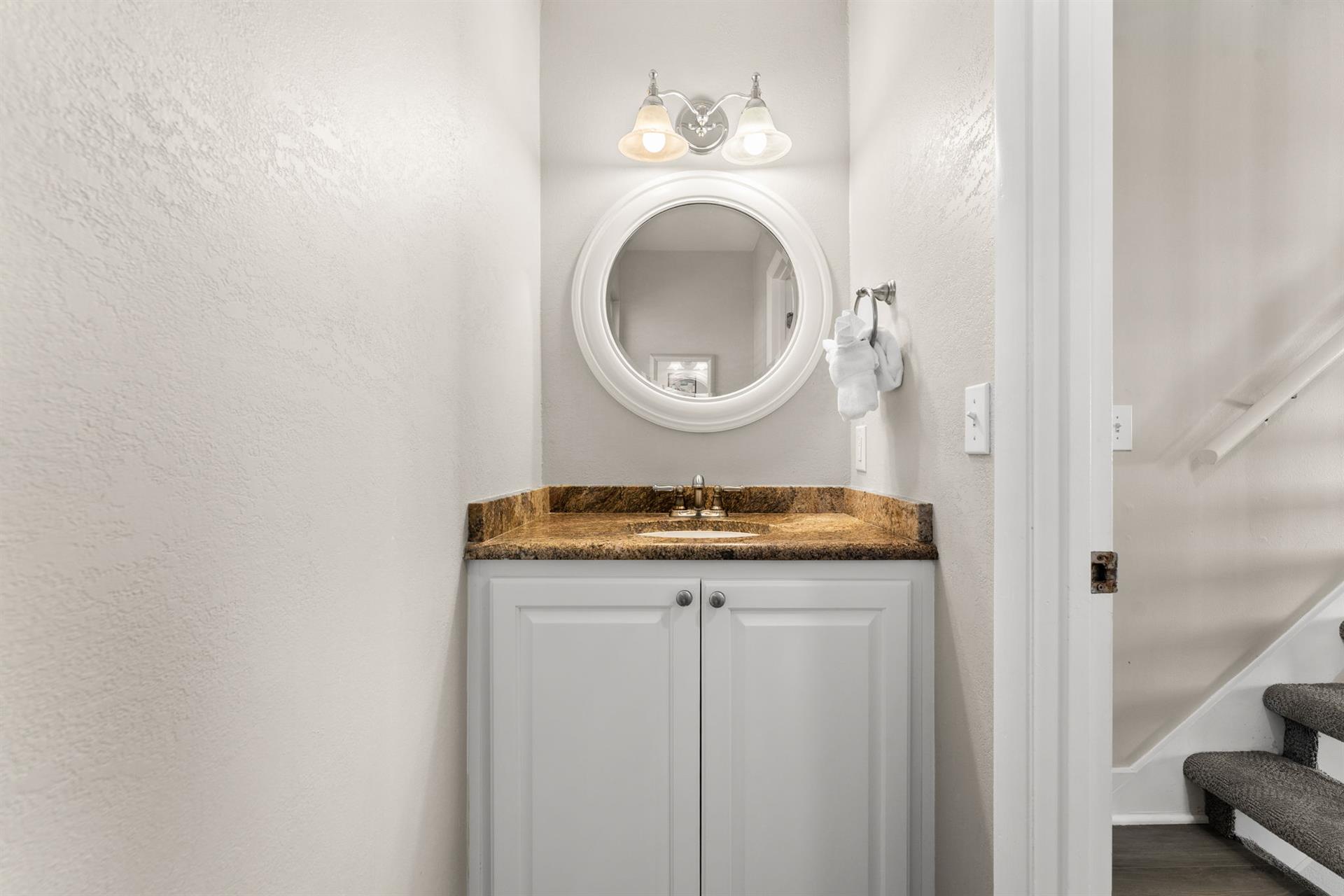 The half bathroom is conveniently located in the main living area