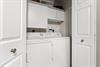 Enjoy the convenience of a private laundry closet located in the garage