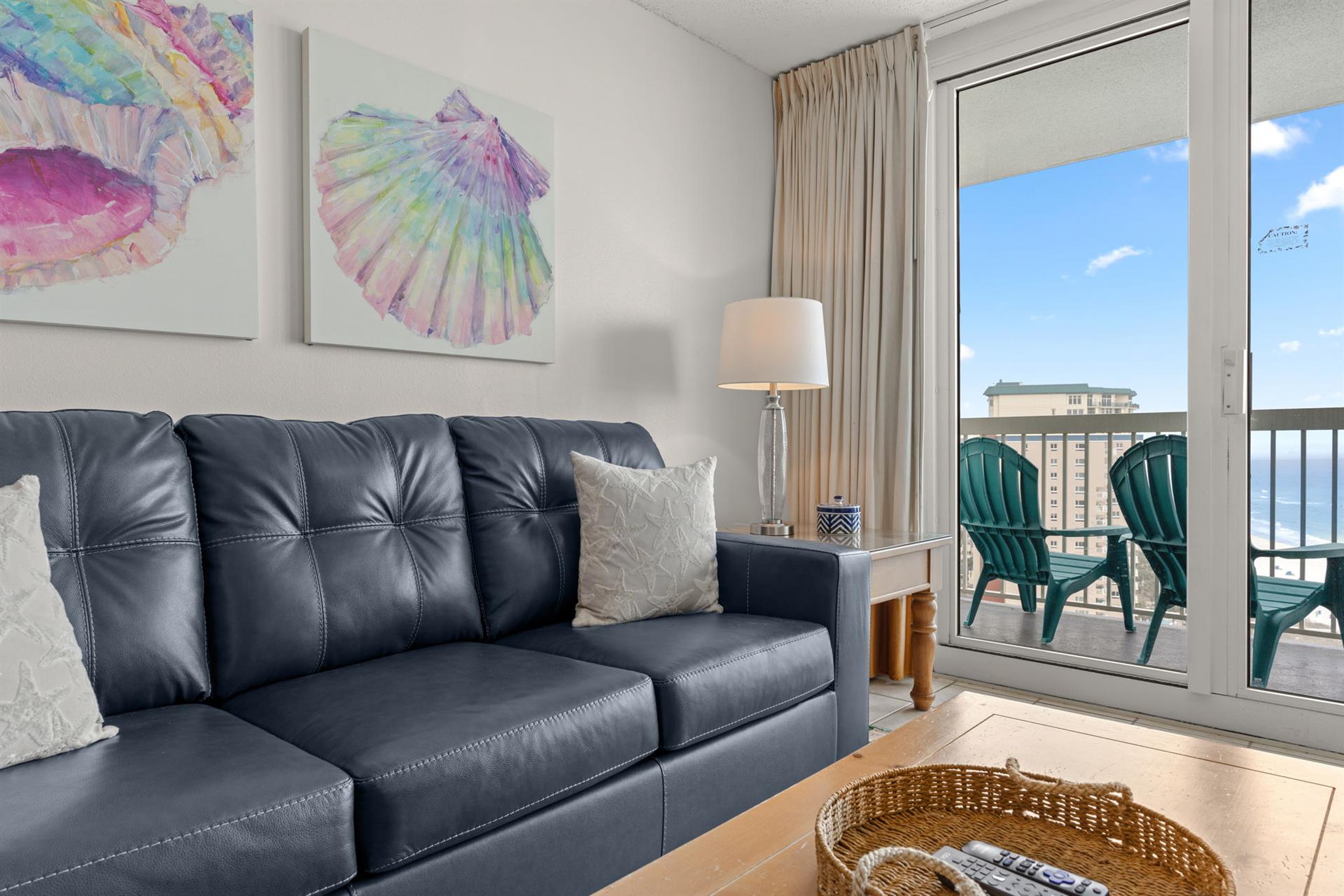 Sink into the plush leather sofa while watching dolphins play