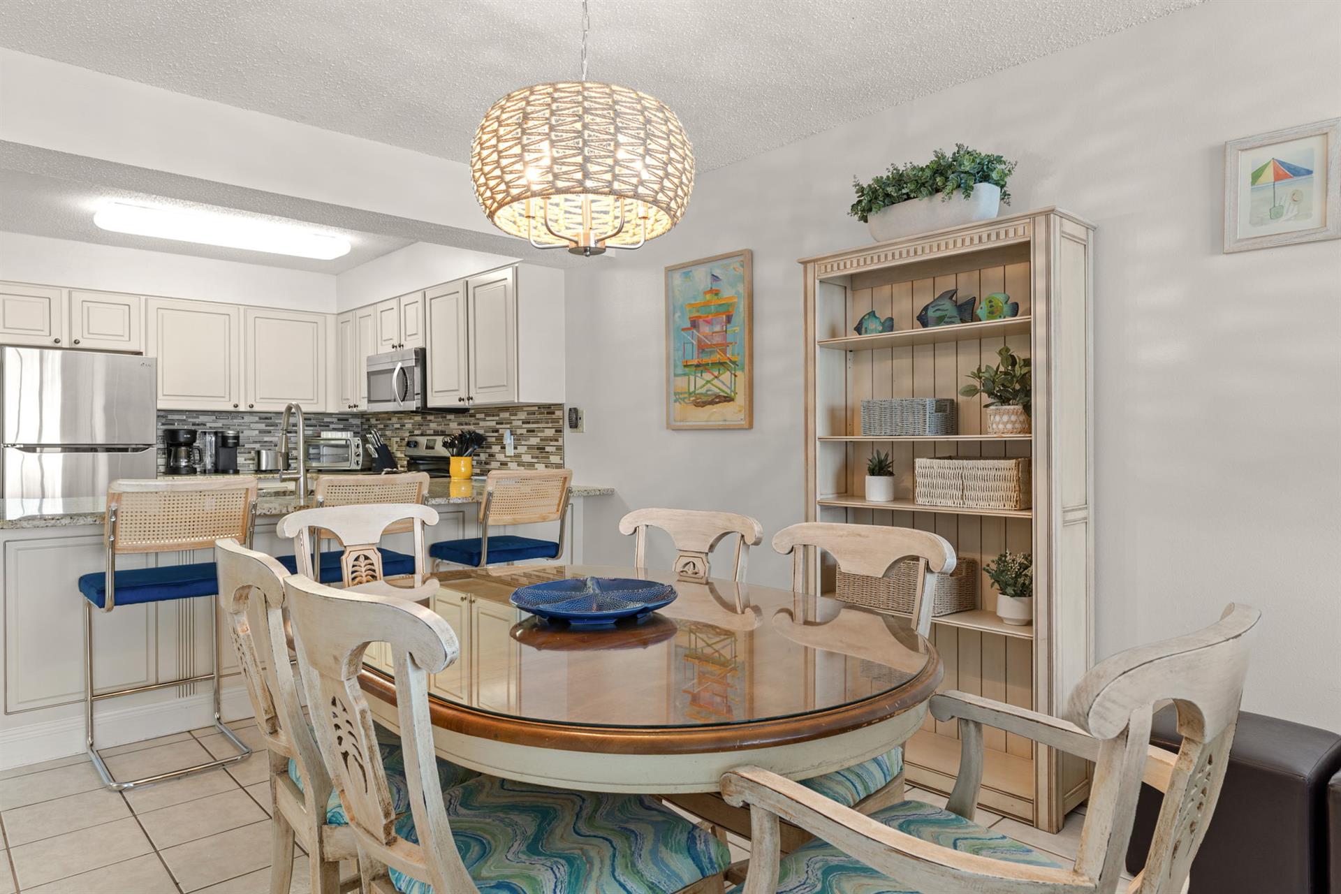 Dining open to kitchen and living