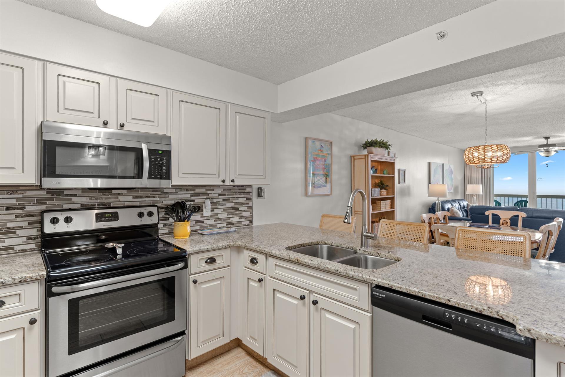 Kitchen open to Dining and living with a Gulf view