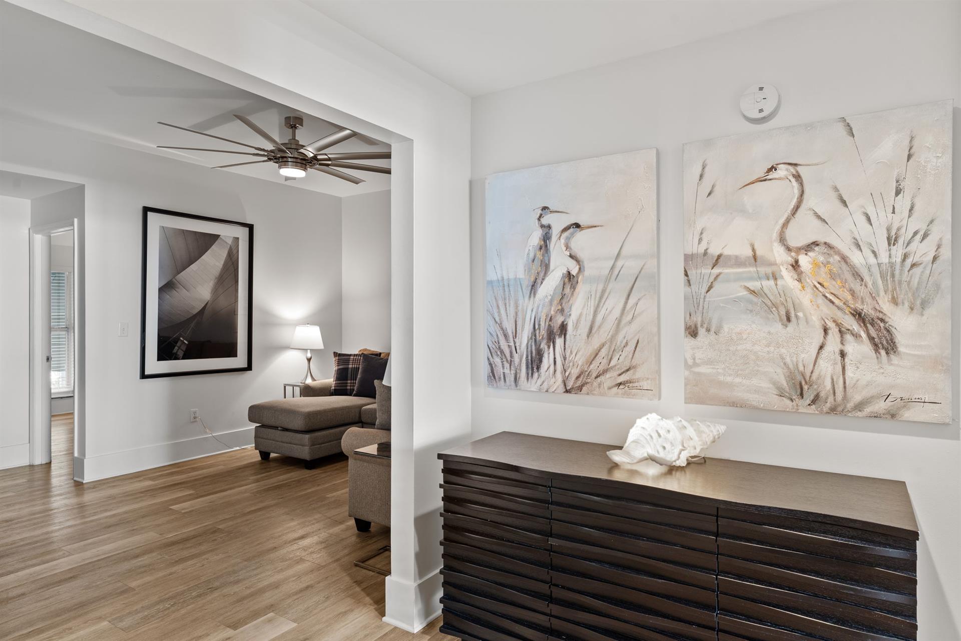 This stylish retreat features beautiful hardwood floors and thoughtfully curated artwork.