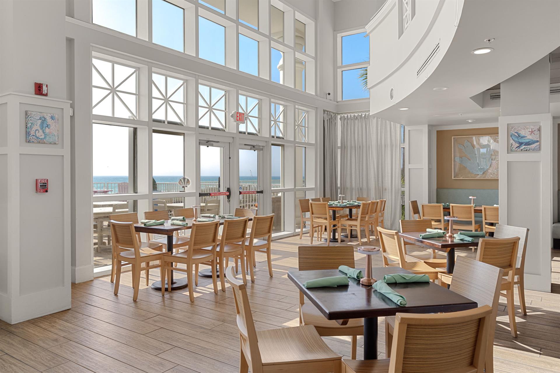 Onsite restaurant with soaring ceilings and stunning gulf views.